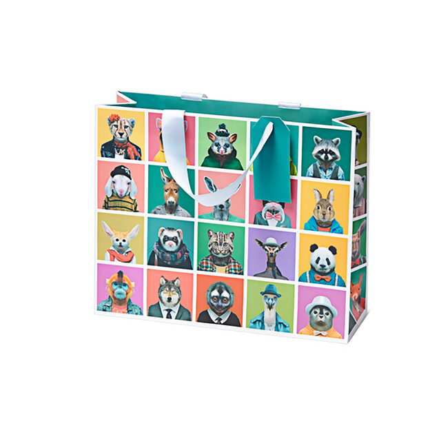 This fun and colourful luxury gift bag design from the talented Spanish designer and photographer Yago Partal features remarkable portraits of everyone’s favourite animals and birds.   Who do they remind you of?